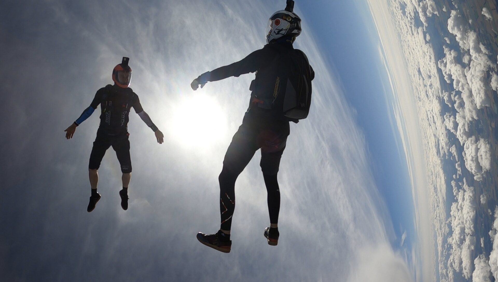 Two skydivers wearing Jedi Airwear J2 Shorty skydiving suits